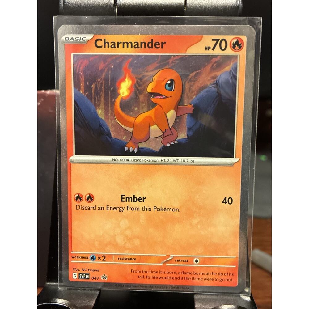 Pokemon TCG Charmander Cosmos Holo Black Star Promo SVP047 Cosmic Swirl PK0023